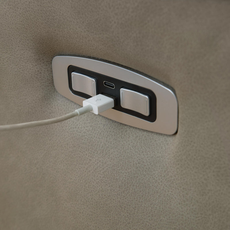 Ashley Furniture Narwhal Place reclining sectional with storage console, showcasing plush fabric, reclining seats, and built-in USB ports.