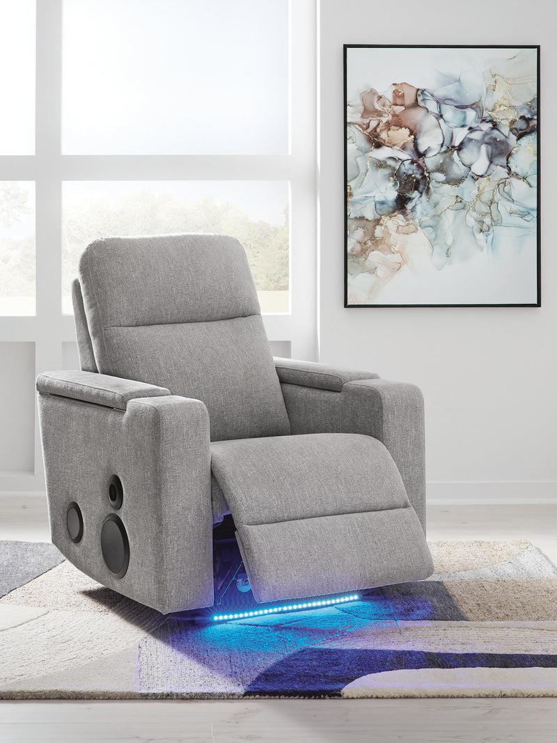 Ashley Furniture Pineland Power Glider Recliner with built-in audio system, shown in open position with LED lighting.