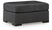 Ashley Furniture Brindley Pier living room set featuring a sofa and loveseat with neutral upholstery and modern design.