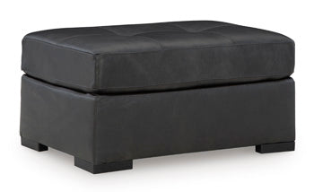 Ashley Furniture Brindley Pier Living Room Set with sofa and armchair, upholstered in neutral fabric, modern design.