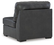 Ashley Furniture Brindley sectional sofa with plush cushions and modern design, shown from the back in this image.