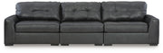 Ashley Furniture Brindley sectional sofa with plush cushions and modern design, shown in a living room setting.