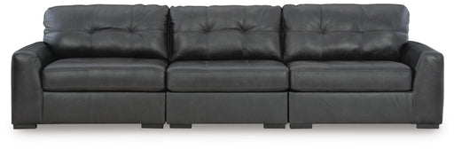 Ashley Furniture Brindley sectional sofa with plush cushions and modern design, shown in a living room setting.