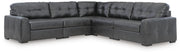 Ashley Furniture Brindley sectional with beige fabric, featuring plush cushions and a modern design for comfortable living space.