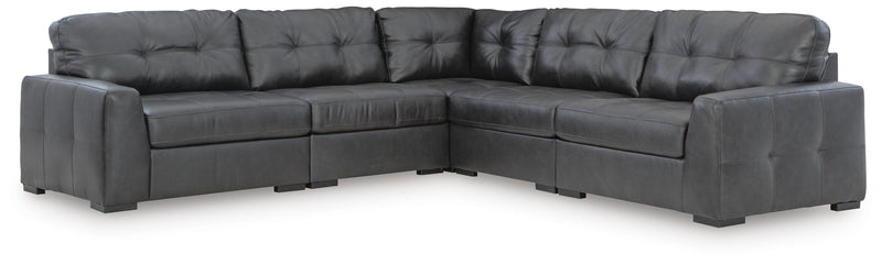 Ashley Furniture Brindley sectional with beige fabric, featuring plush cushions and a modern design for comfortable living space.