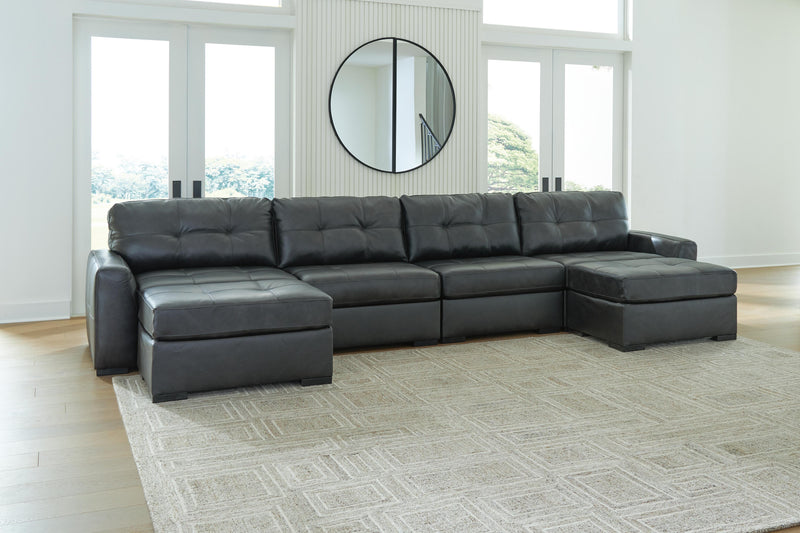 Ashley Furniture Brindley Pier living room set with plush sofa and matching chairs, featuring neutral upholstery and contemporary design.