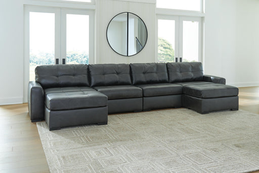 Ashley Furniture Brindley Pier living room set with plush sofa and matching chairs, featuring neutral upholstery and contemporary design.
