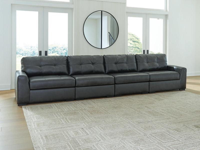 Ashley Furniture Brindley Pier living room set featuring a sofa and loveseat with plush cushions and neutral upholstery.