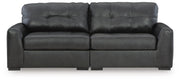 Ashley Furniture Brindley Pier Sectional Loveseat with plush cushions and neutral upholstery, suitable for modern living rooms.
