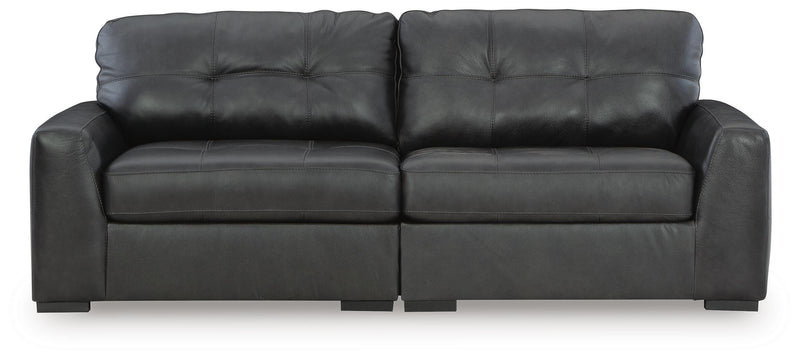 Ashley Furniture Brindley Pier Sectional Loveseat with plush cushions and neutral upholstery, suitable for modern living rooms.
