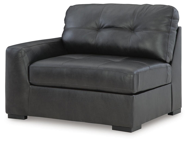 Ashley Furniture Brindley Pier living room set featuring a sofa and loveseat with plush cushions and neutral upholstery.