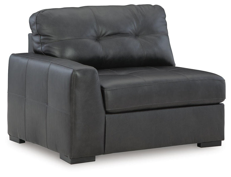Ashley Furniture Brindley Pier living room set with sofa and loveseat, shown from an angled perspective in a modern living space.