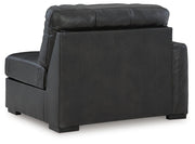 Ashley Furniture Brindley Pier living room set with sectional sofa and armchair, featuring plush cushions and neutral upholstery.
