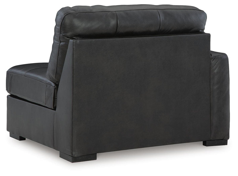 Ashley Furniture Brindley Pier living room set with sectional sofa and armchair, featuring plush cushions and neutral upholstery.