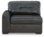 Ashley Furniture Brindley Pier living room set featuring a sofa and loveseat with neutral fabric and plush cushions.