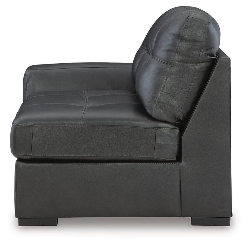 Ashley Furniture Brindley Pier living room set with sofa, loveseat, and armchair in a cozy, modern living room arrangement.