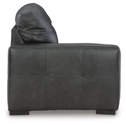 Ashley Furniture Brindley sectional with plush fabric, featuring a right-side chaise and modern design, shown in a stylish living room setting.