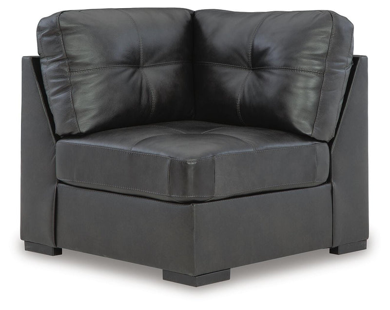 Ashley Furniture Brindley sectional with plush cushions and fabric upholstery, shown from a head-on perspective.