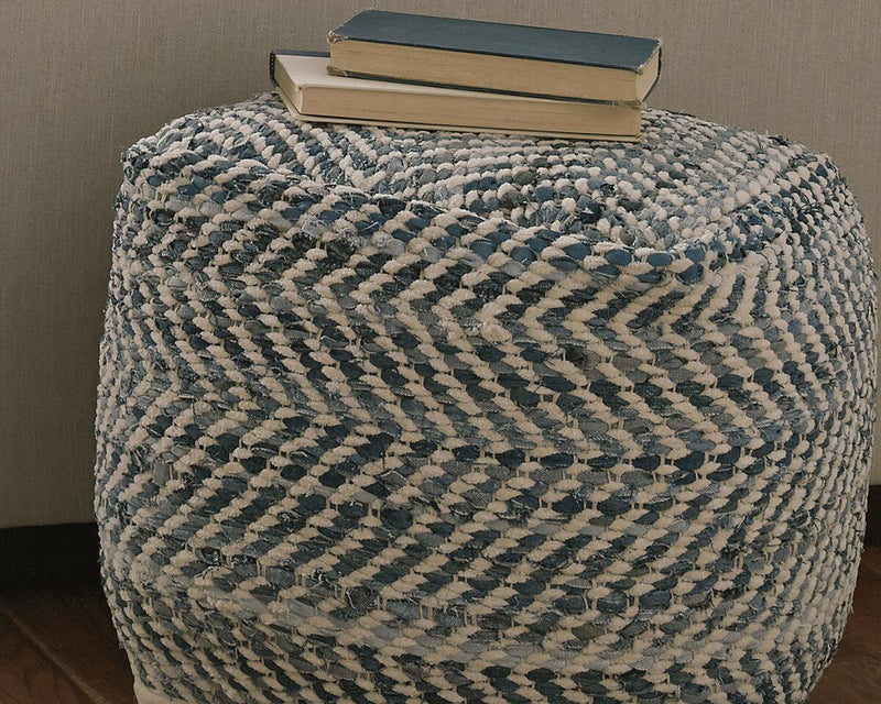 Ashley Furniture Chevron Pouf in neutral fabric, round ottoman with geometric chevron pattern for stylish living room decor