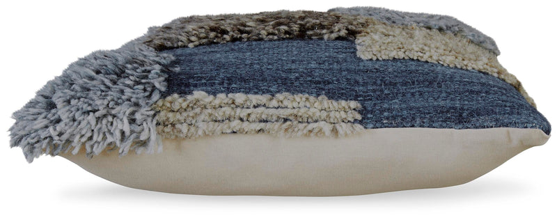 Ashley Furniture Gibbend Pillow with textured fabric and decorative design, perfect for accenting sofa or bed decor.