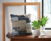 Ashley Furniture Gibbend Pillow with textured fabric and decorative design, perfect for adding style to your living space.