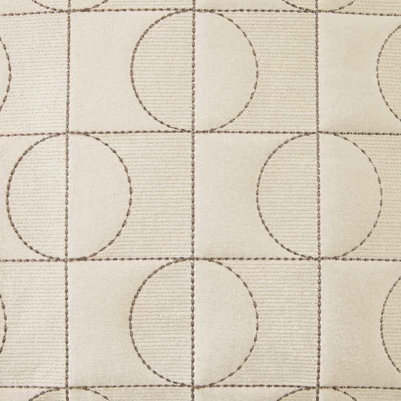 Set of four Ashley Furniture Kydner decorative pillows with textured fabric and neutral tones, perfect for sofa or bed decor.