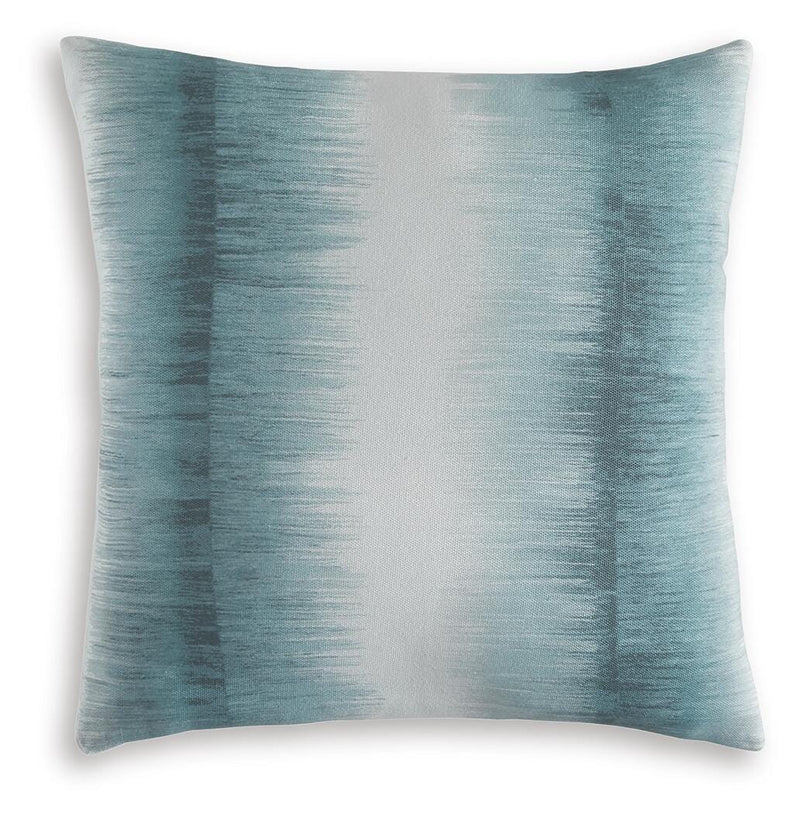 Set of four Ashley Furniture Elonwich pillows with soft fabric covers, arranged on a neutral-colored sofa.
