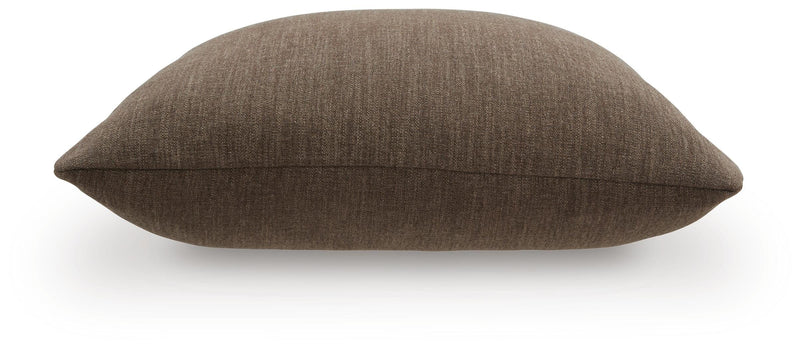 Set of four Ashley Furniture Brockbert pillows featuring soft fabric and decorative patterns on a neutral background.