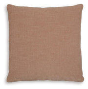 Set of four Ashley Furniture Brockbert pillows with soft fabric covers and decorative stitching, perfect for home decor.