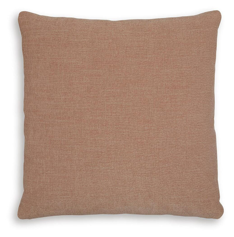 Set of four Ashley Furniture Brockbert pillows with soft fabric covers and decorative stitching, perfect for home decor.