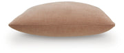 Set of four Ashley Furniture Brockbert pillows with soft fabric covers and decorative patterns arranged together.