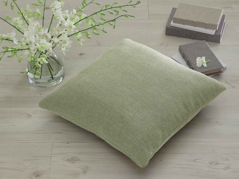 Set of four Ashley Furniture Brockbert pillows with geometric patterns in neutral tones, perfect for modern home decor.