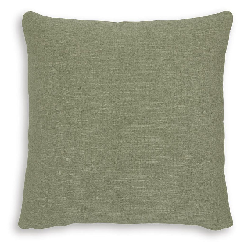 Set of four Ashley Furniture Brockbert pillows featuring soft fabric and decorative patterns for cozy home decor.