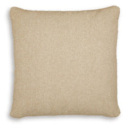 Set of four Ashley Furniture Macsen pillows with decorative patterns and soft fabric, perfect for enhancing bedroom or living room decor.