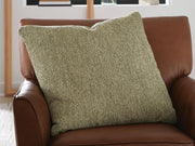 Set of four Macsen pillows by Ashley Furniture featuring soft fabric and decorative patterns on a neutral background.