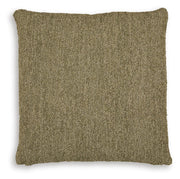 Set of four Macsen pillows by Ashley Furniture, featuring soft fabric and decorative patterns on a cozy living room sofa.
