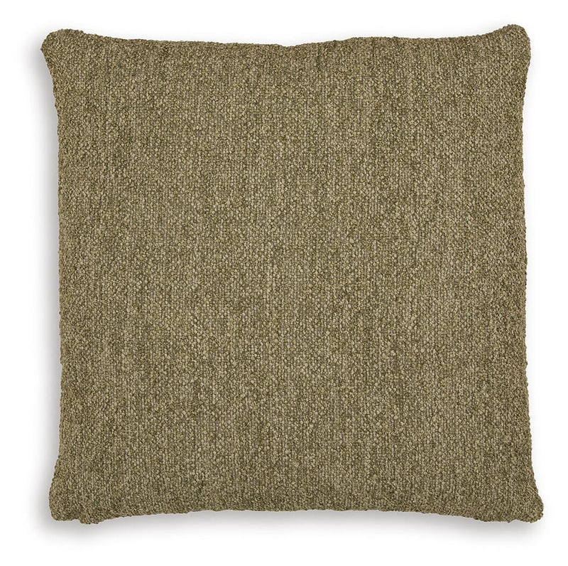 Set of four Macsen pillows by Ashley Furniture, featuring soft fabric and decorative patterns on a cozy living room sofa.