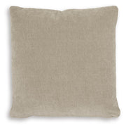 Set of four Ashley Furniture Jaxkins pillows with soft fabric and decorative patterns, arranged on a cozy sofa.