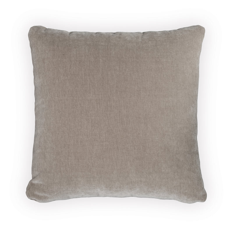 Set of four Ashley Furniture Jaxkins pillows with soft fabric and decorative patterns, shown on a cozy sofa.