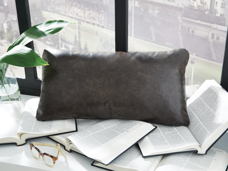 Set of four Ashley Furniture Danvale pillows featuring soft fabric covers and decorative patterns for cozy home decor.