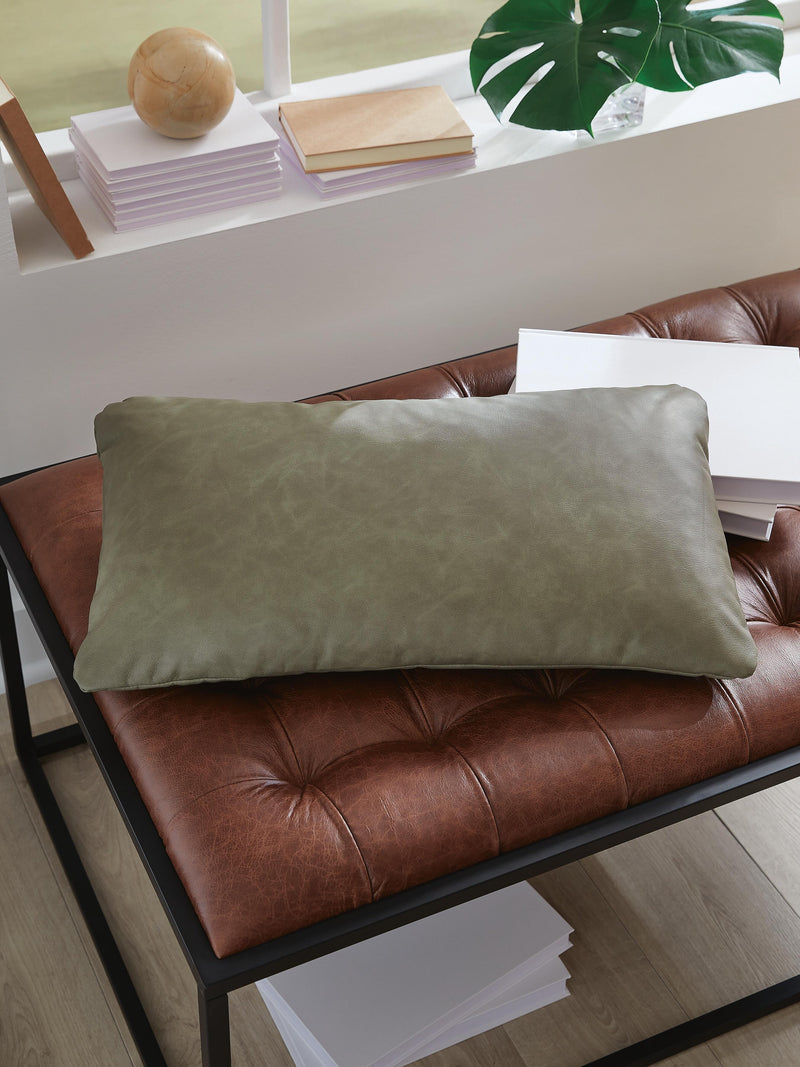 Set of four Ashley Furniture Danvale decorative pillows with patterned fabric and plush filling for comfortable home decor.