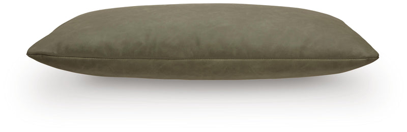 Set of four Ashley Furniture Danvale pillows with soft fabric covers, shown arranged on a bed for comfortable decor.