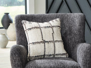 Set of four Ashley Furniture Wimings pillows featuring stylish fabric covers, perfect for home decor and comfortable seating.