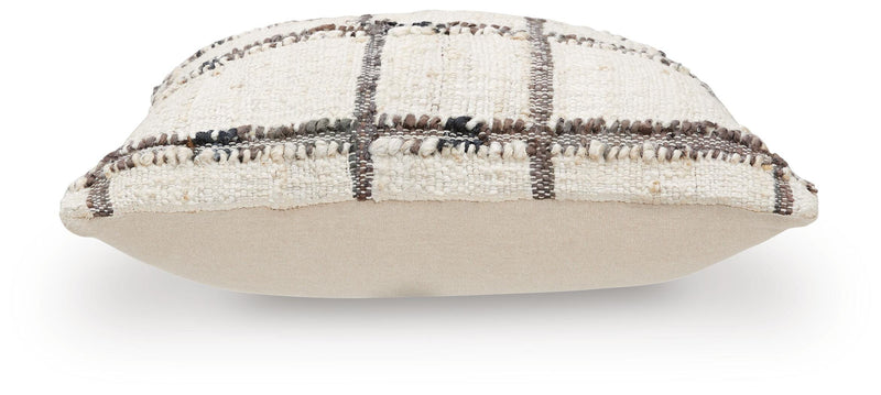 Set of four Ashley Furniture Wimings pillows with decorative fabric covers, arranged on a sofa for modern home decor.