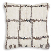 Set of four Ashley Furniture Wimings pillows with decorative fabric covers, ideal for enhancing bedroom or living room decor.