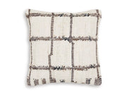 Set of four Ashley Furniture Wimings pillows with soft fabric covers, arranged on a cozy sofa for stylish home decor.