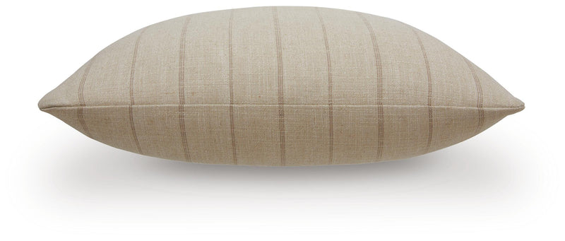 Set of four Ashley Furniture Valwick pillows with soft, textured fabric in neutral tones, perfect for home decor and comfort.