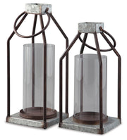 Set of two Diedrick lantern candle holders by Ashley Furniture with metal frames and glass panels, perfect for decorative lighting.