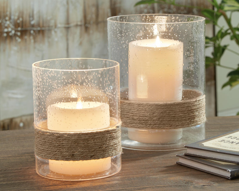 Set of two Ashley Furniture Eudocia candle holders featuring elegant design and sturdy bases, perfect for home decor.