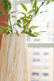 Ashley Furniture Cammen Vase featuring a sleek, modern design with textured surface and neutral tones, perfect for home décor.